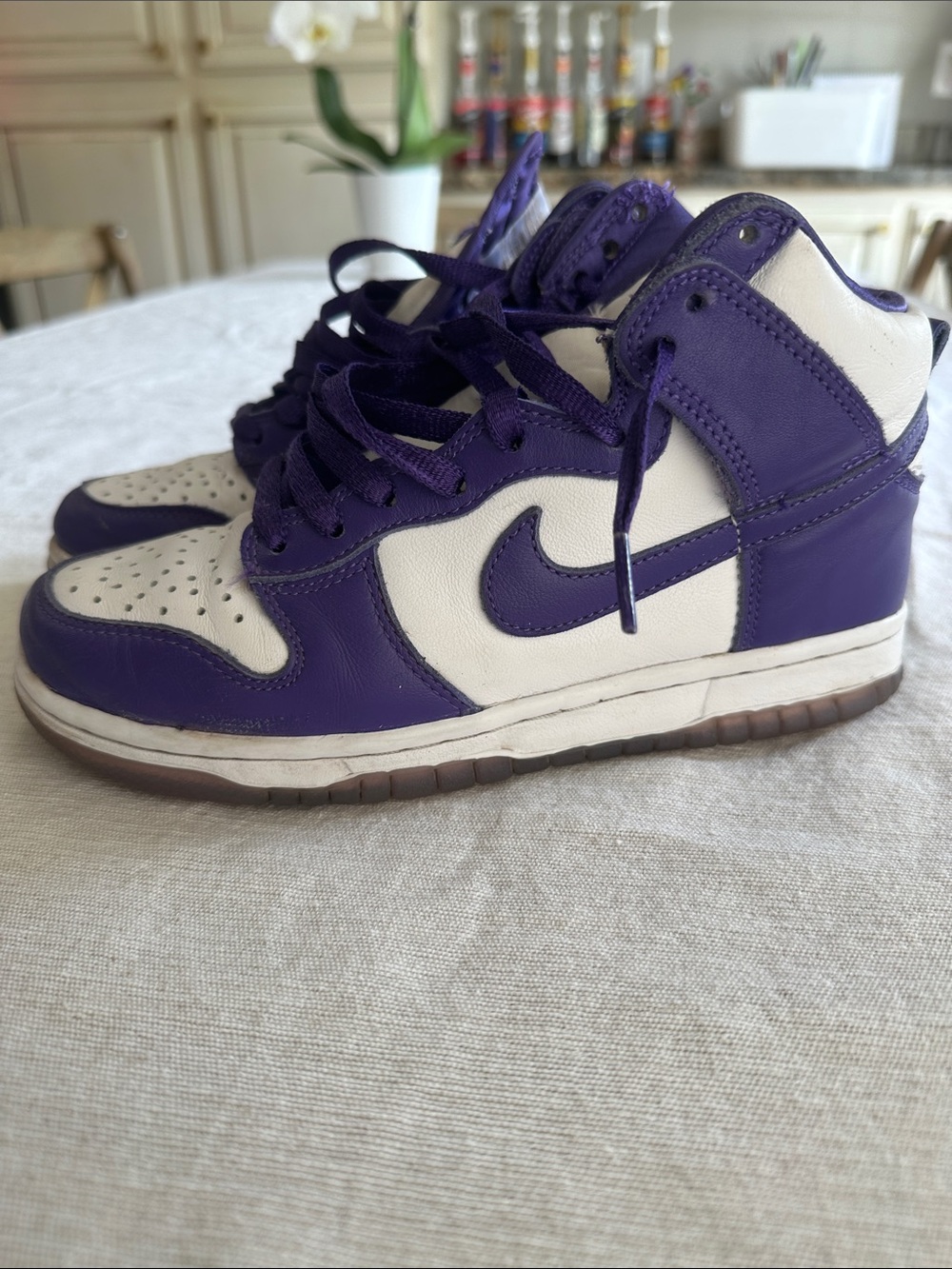Nike Woman’s High-Top Dunks in Purple and White Leather